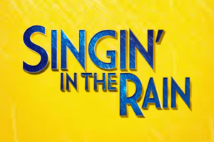 Yellow poster with bold blue 3D text 'Singin' in the Rain'.