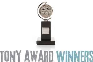 Tony Award trophy on a black pedestal with the words 'TONY AWARD WINNERS' displayed across the bottom edge of the image.