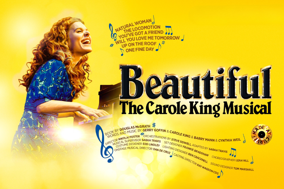 Poster of a woman with red curly hair singing at a piano on a bright yellow background, with the title 'Beautiful: The Carole King Musical' and musical notes.