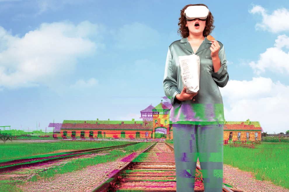 Woman wearing a virtual reality headset stands on railroad tracks outdoors, holding a bag of chips and a cookie.